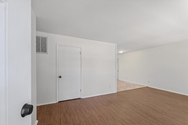1807 Broadmoor Dr, Champaign, IL 61821 - bonus room featuring wood finished floors and baseboards