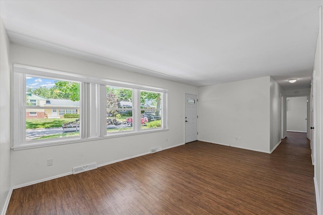 1807 Broadmoor Dr, Champaign, IL 61821 - empty room featuring dark wood finished floors
