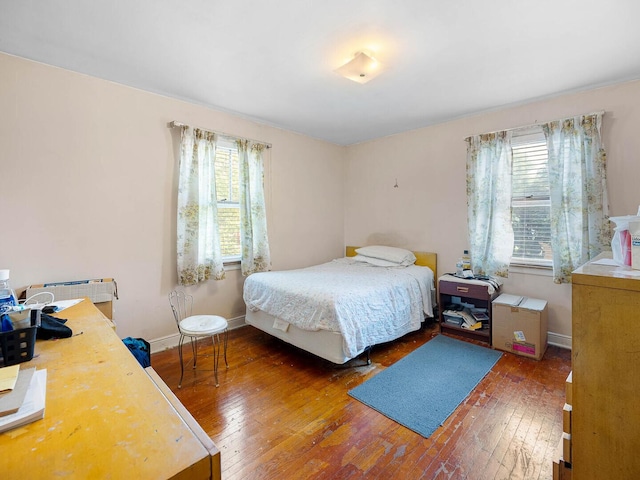 10458 S Forest Ave, Chicago, IL 60628 - bedroom with hardwood / wood-style floors and multiple windows
