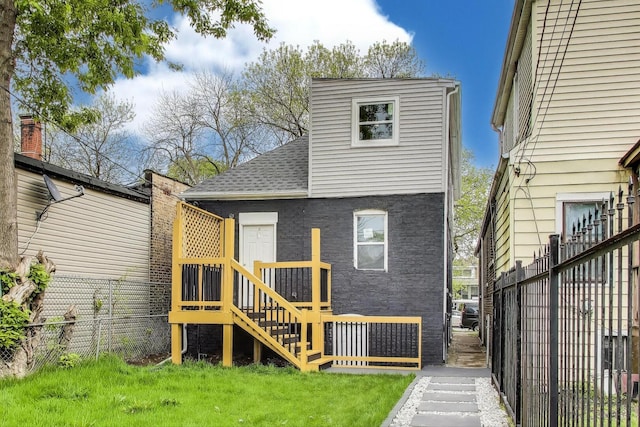 7716 S Rhodes Ave, Chicago, IL 60619 - rear view of property featuring a shingled roof