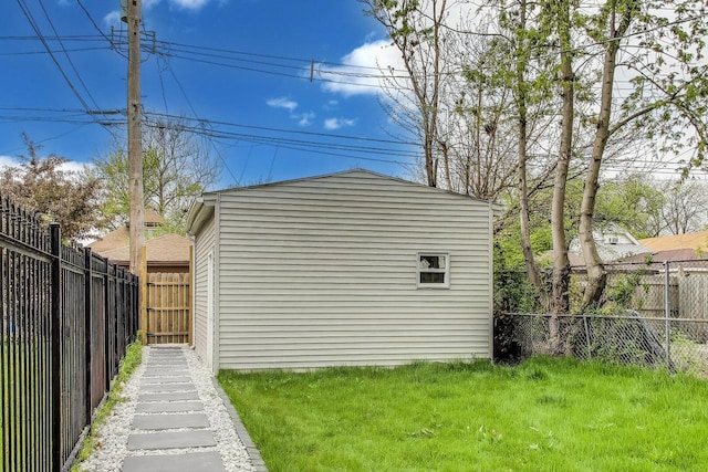 7716 S Rhodes Ave, Chicago, IL 60619 - view of outdoor structure featuring a fenced backyard