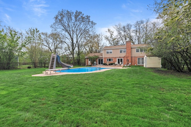 49 Red Oak Ln, Highland Park, IL 60035 - view of swimming pool with a water slide and a patio area