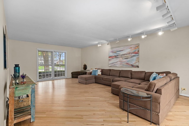 49 Red Oak Ln, Highland Park, IL 60035 - living room featuring track lighting and light wood-style flooring