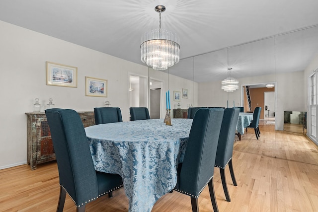 49 Red Oak Ln, Highland Park, IL 60035 - dining space with a chandelier and light wood-type flooring