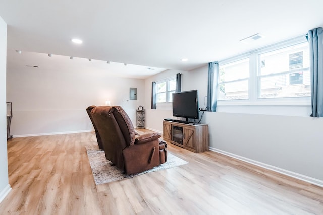 1021 Otis Ave, Rockdale, IL 60436 - living area featuring light wood-style flooring, electric panel, and recessed lighting