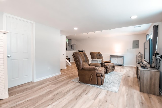 1021 Otis Ave, Rockdale, IL 60436 - living area featuring light wood-style floors, electric panel, and recessed lighting