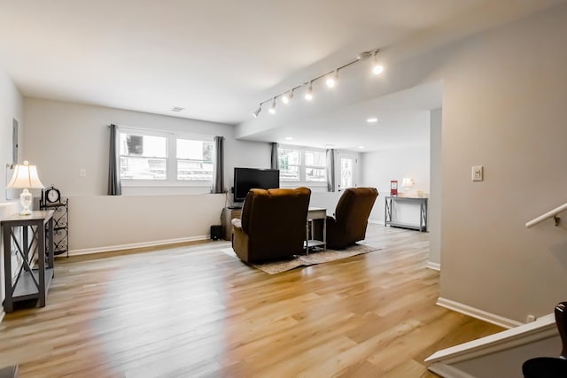 1021 Otis Ave, Rockdale, IL 60436 - living area with light wood-style floors and track lighting