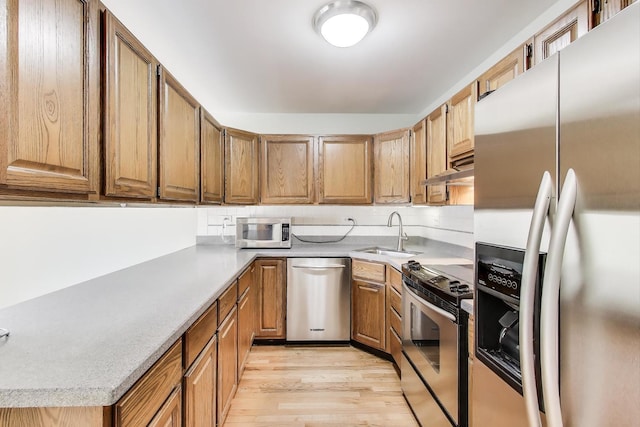 108 Bishop Quarter Ln, Oak Park, IL 60302 - kitchen with stainless steel appliances, light wood-type flooring, light countertops, and under cabinet range hood
