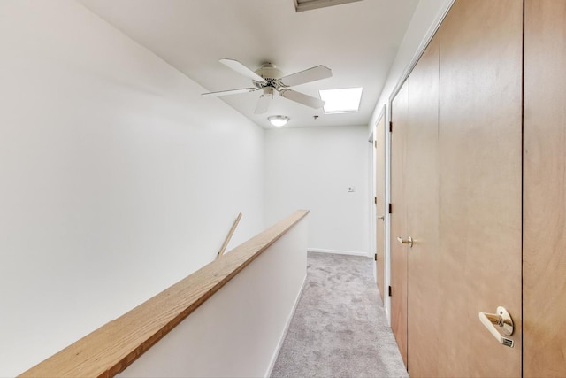 108 Bishop Quarter Ln, Oak Park, IL 60302 - hall featuring light colored carpet, an upstairs landing, and a skylight
