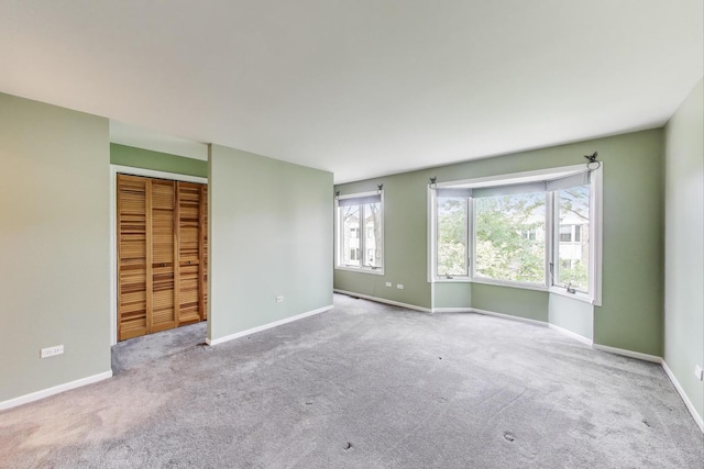 108 Bishop Quarter Ln, Oak Park, IL 60302 - carpeted empty room with baseboards