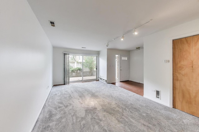 108 Bishop Quarter Ln, Oak Park, IL 60302 - carpeted spare room featuring rail lighting and baseboards