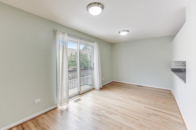 108 Bishop Quarter Ln, Oak Park, IL 60302 - empty room with wood finished floors and baseboards