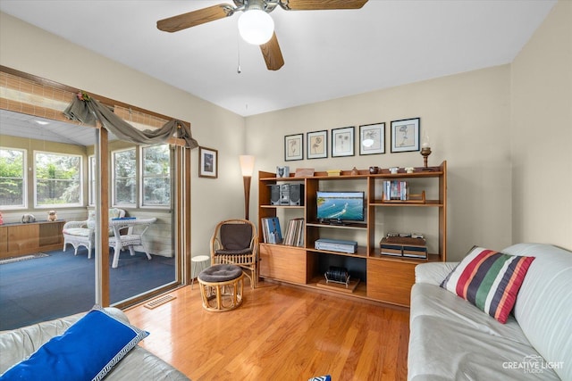 872 Shady Ln, Aurora, IL 60506 - living room with wood finished floors and a ceiling fan