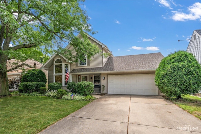 872 Shady Ln, Aurora, IL 60506 - view of front of house featuring a garage, driveway, a front yard, and a shingled roof