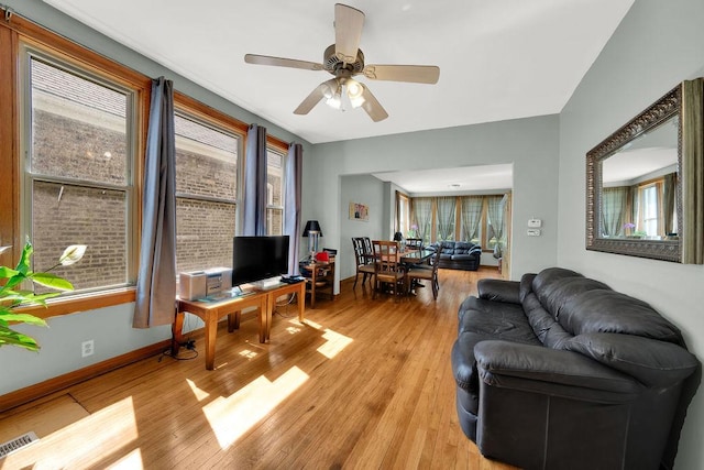 3408 W Marquette Rd, Chicago, IL 60629 - living room featuring light wood-style floors and ceiling fan