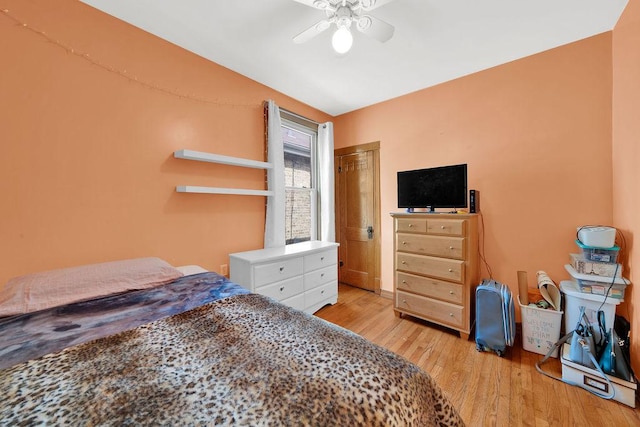 3408 W Marquette Rd, Chicago, IL 60629 - bedroom featuring wood finished floors and a ceiling fan