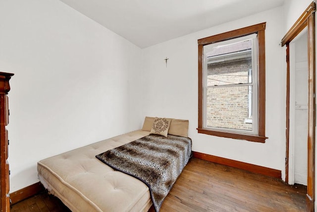3408 W Marquette Rd, Chicago, IL 60629 - bedroom with baseboards and wood-type flooring