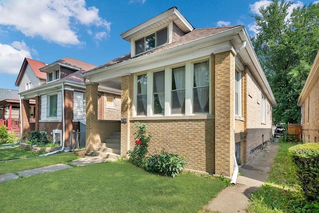 3408 W Marquette Rd, Chicago, IL 60629 - bungalow with brick siding and a front yard