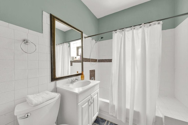 3408 W Marquette Rd, Chicago, IL 60629 - full bathroom with tile walls, vanity, and shower / tub combo with curtain