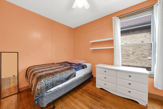 3408 W Marquette Rd, Chicago, IL 60629 - bedroom with wood finished floors and a ceiling fan