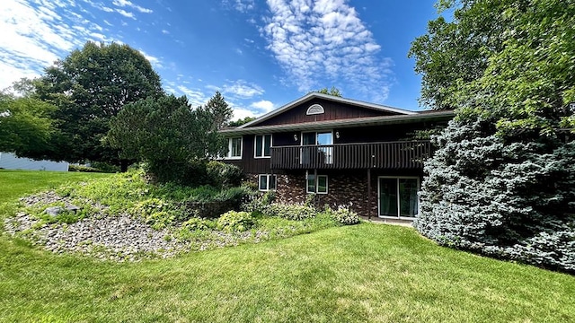 16179 Greenland Dr, Morrison, IL 61270 - back of house with a lawn and brick siding
