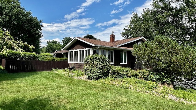16179 Greenland Dr, Morrison, IL 61270 - rear view of property featuring a chimney