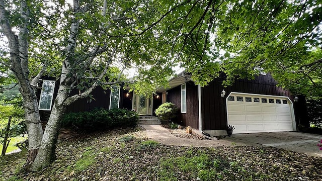 16179 Greenland Dr, Morrison, IL 61270 - view of front of property with concrete driveway and a garage