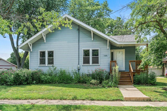144 Greenley St, Woodstock, IL 60098 - bungalow with a front lawn