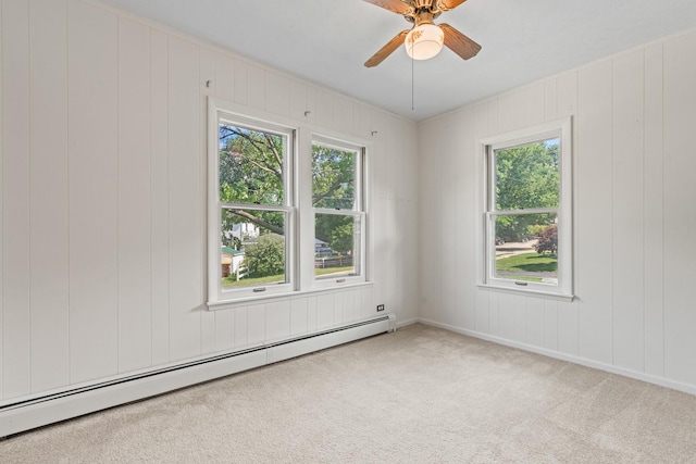 144 Greenley St, Woodstock, IL 60098 - unfurnished room featuring a baseboard radiator, ceiling fan, and carpet