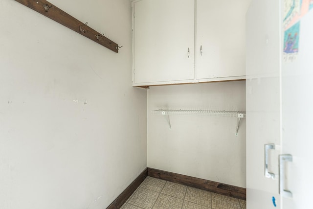 536 Center Ave, Sycamore, IL 60178 - washroom featuring baseboards and tile patterned floors