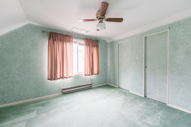 536 Center Ave, Sycamore, IL 60178 - unfurnished bedroom with a baseboard radiator, vaulted ceiling, carpet, and a ceiling fan
