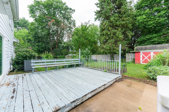 536 Center Ave, Sycamore, IL 60178 - wooden deck featuring a shed, a fenced backyard, and view of scattered trees