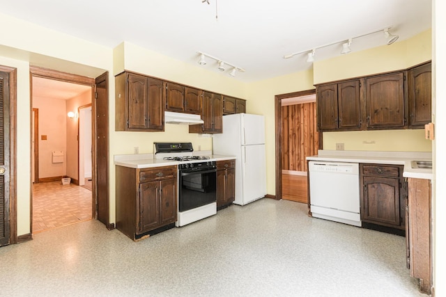 536 Center Ave, Sycamore, IL 60178 - kitchen with white appliances, under cabinet range hood, and dark brown cabinets