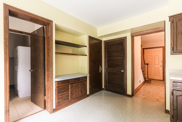 536 Center Ave, Sycamore, IL 60178 - hallway with baseboards and light floors