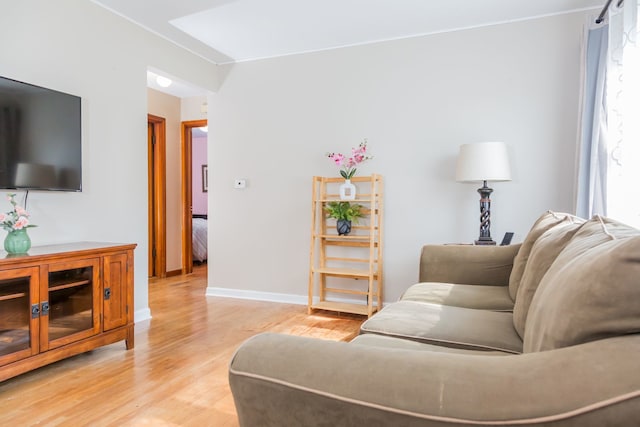 204 N Elroy Ave, Bartlett, IL 60103 - living room with light wood-style floors and crown molding