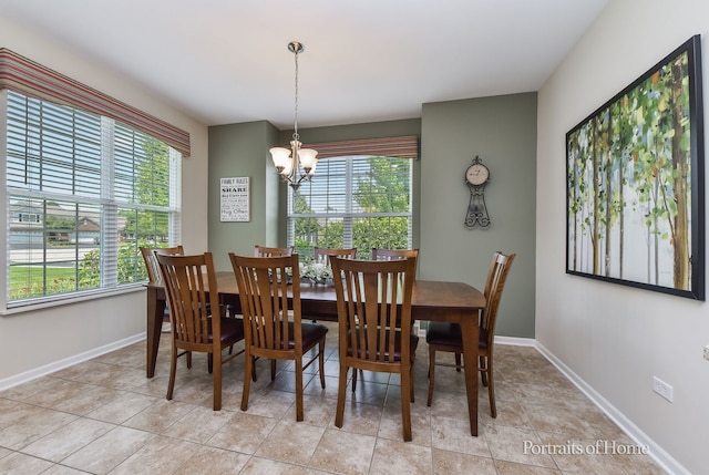 2065 John Paul Jones Ln Unit 2065, Bolingbrook, IL 60490 - dining space featuring a chandelier and light tile patterned floors