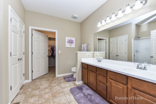 2065 John Paul Jones Ln Unit 2065, Bolingbrook, IL 60490 - full bath with double vanity, tile patterned flooring, and a walk in closet