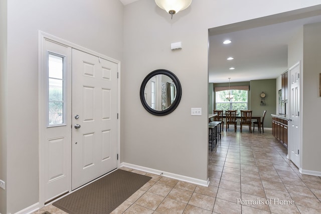 2065 John Paul Jones Ln Unit 2065, Bolingbrook, IL 60490 - entryway with light tile patterned flooring and recessed lighting