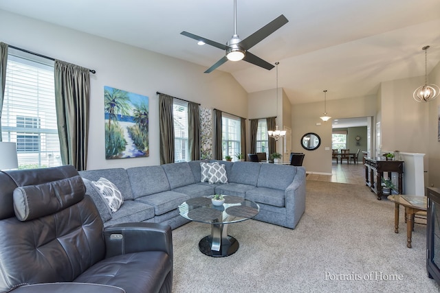 2065 John Paul Jones Ln Unit 2065, Bolingbrook, IL 60490 - living area with a chandelier, lofted ceiling, light colored carpet, and a ceiling fan