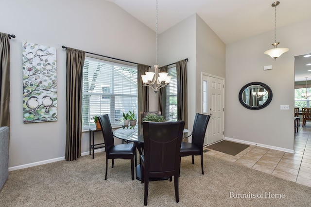 2065 John Paul Jones Ln Unit 2065, Bolingbrook, IL 60490 - dining space featuring a chandelier, high vaulted ceiling, and carpet