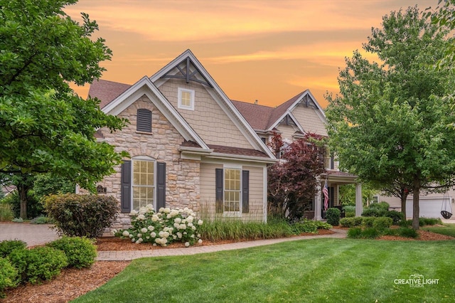 3704 Heathmoor Dr, Elgin, IL 60124 - craftsman house with stone siding, a yard, and roof with shingles