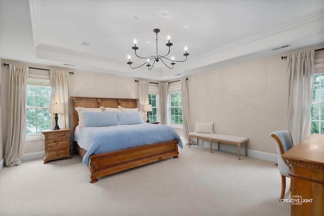 3704 Heathmoor Dr, Elgin, IL 60124 - carpeted bedroom featuring a raised ceiling, a chandelier, multiple windows, and ornamental molding