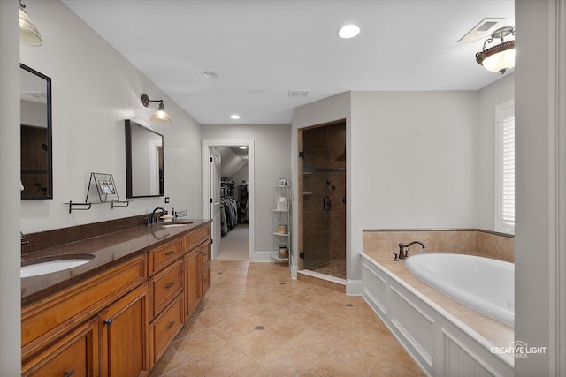 3704 Heathmoor Dr, Elgin, IL 60124 - full bath with a stall shower, a garden tub, double vanity, a walk in closet, and tile patterned floors