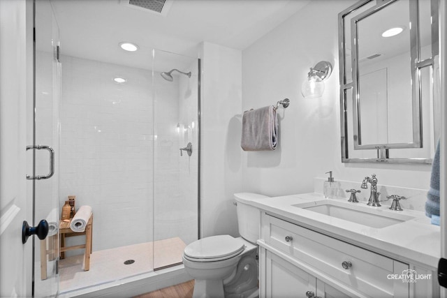 3704 Heathmoor Dr, Elgin, IL 60124 - full bathroom with a shower stall, vanity, wood finished floors, and recessed lighting