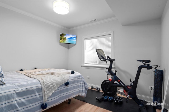 3704 Heathmoor Dr, Elgin, IL 60124 - bedroom with wood finished floors and ornamental molding