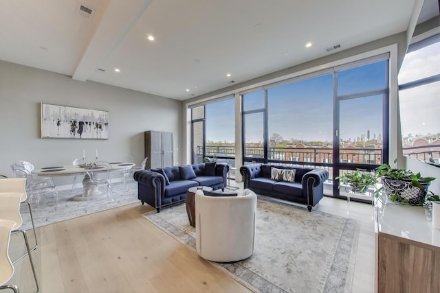 2405 W Iowa St Unit 405, Chicago, IL 60622 - living area featuring light wood-type flooring, healthy amount of natural light, and recessed lighting