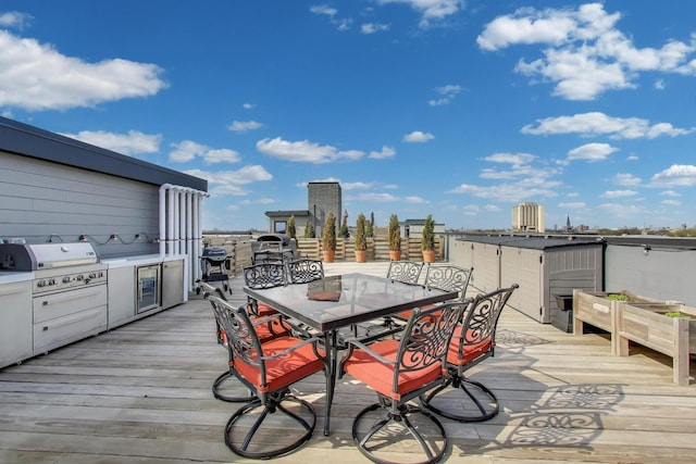 2405 W Iowa St Unit 405, Chicago, IL 60622 - wooden terrace with outdoor dining space, area for grilling, and wine cooler