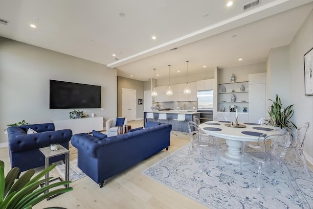 2405 W Iowa St Unit 405, Chicago, IL 60622 - living room featuring light wood-type flooring and recessed lighting