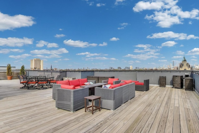 2405 W Iowa St Unit 405, Chicago, IL 60622 - wooden terrace with an outdoor living space, outdoor dining space, and a view of city