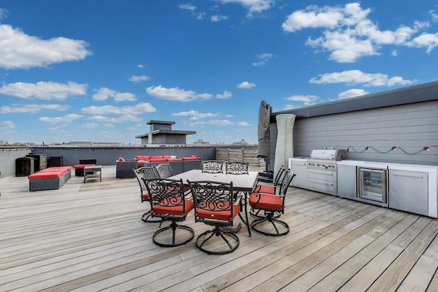 2405 W Iowa St Unit 405, Chicago, IL 60622 - wooden deck featuring area for grilling, beverage cooler, and outdoor dining space